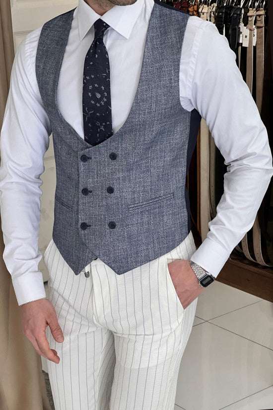 
                  
                    Slim Fit Self Patterned Double Breasted Blue Wool Waistcoat
                  
                