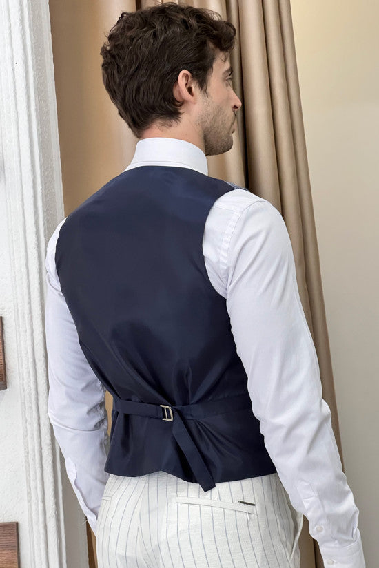 
                  
                    Slim Fit Self Patterned Double Breasted Blue Wool Waistcoat
                  
                