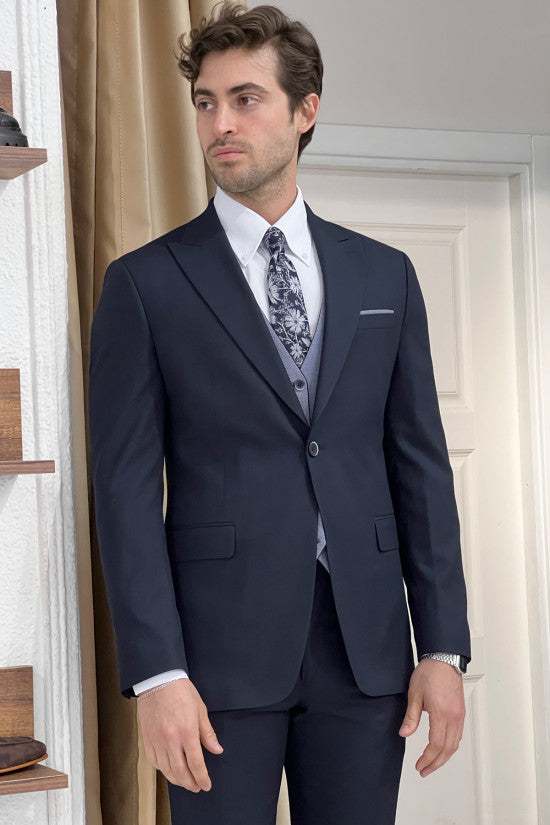 
                  
                    Slim Fit Self-Patterned Navy Blue Wool Vest Combination Suit ( The waistcoat is double-sided. )
                  
                