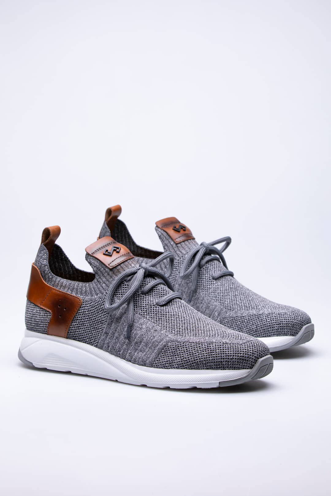 
                  
                    Grey Pavola
                  
                