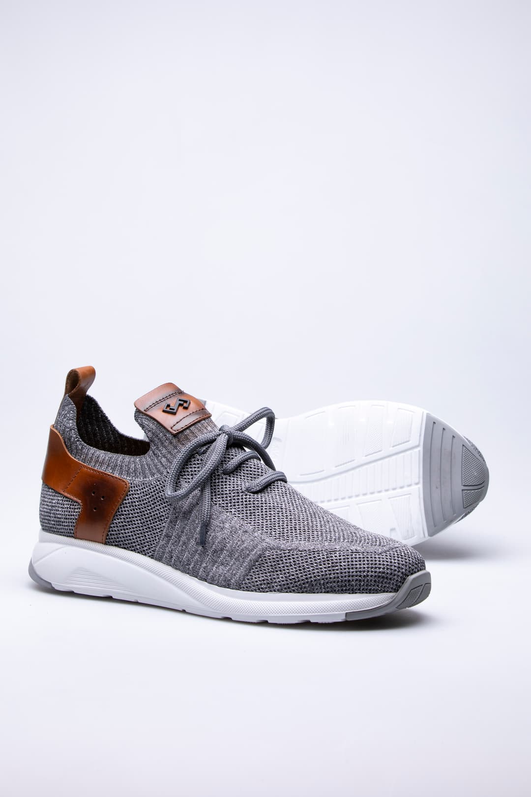 
                  
                    Grey Pavola
                  
                