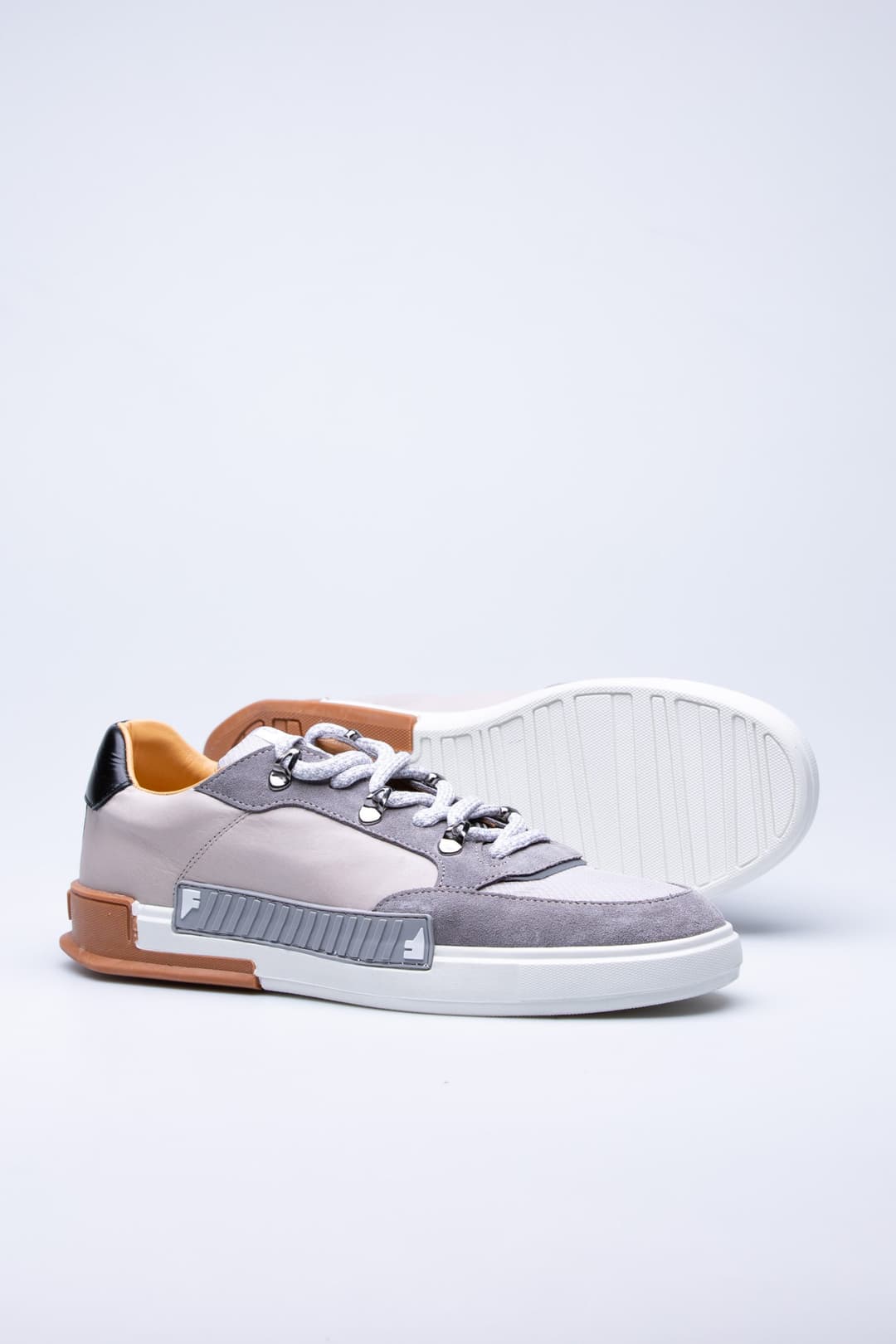 
                  
                    Grey Rubik
                  
                