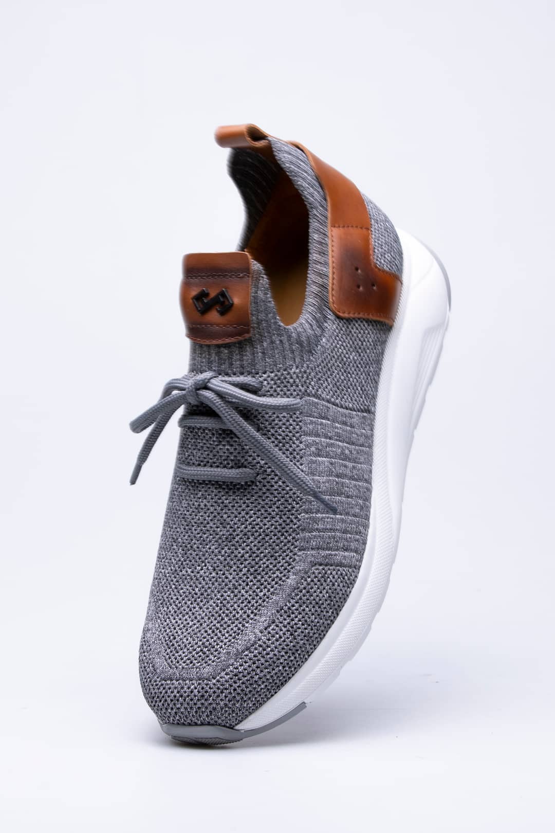 
                  
                    Grey Pavola
                  
                