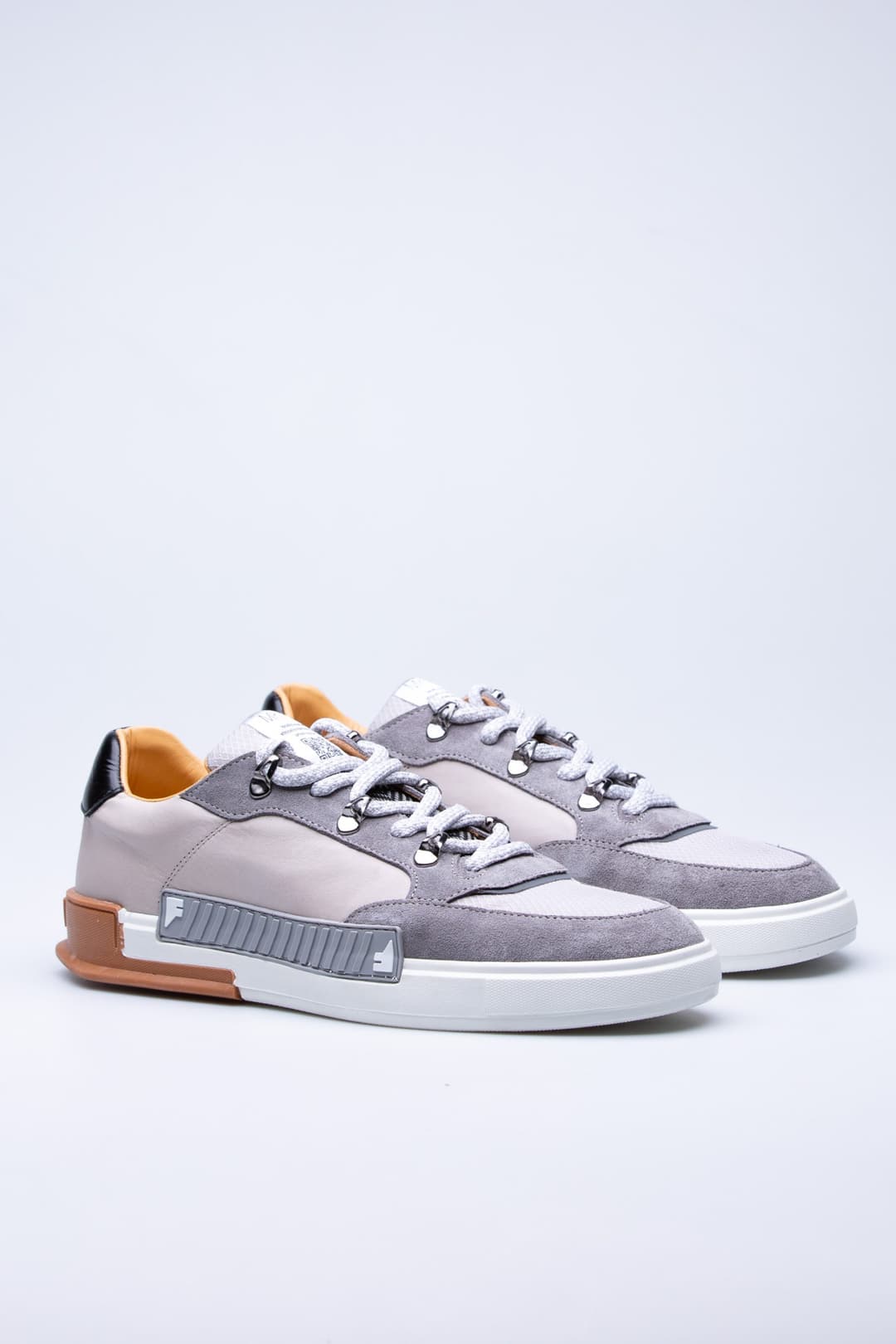 
                  
                    Grey Rubik
                  
                