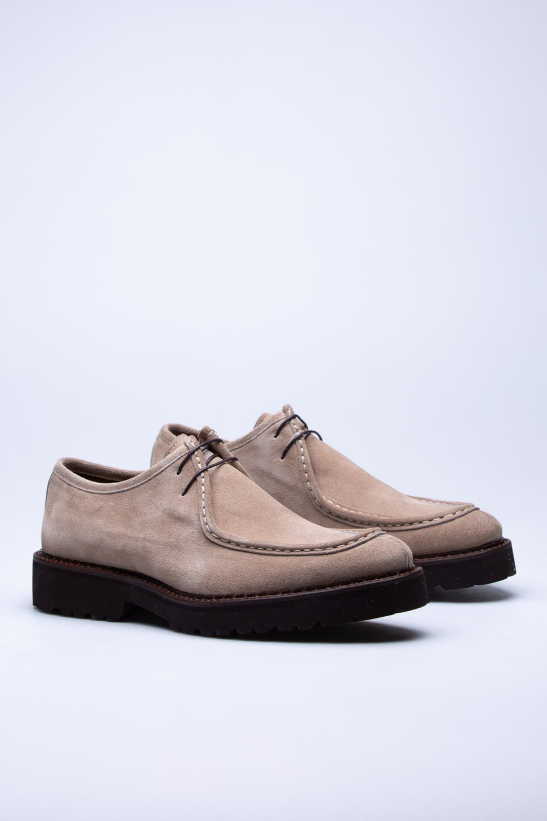 
                  
                    Beige Suede Kruz
                  
                