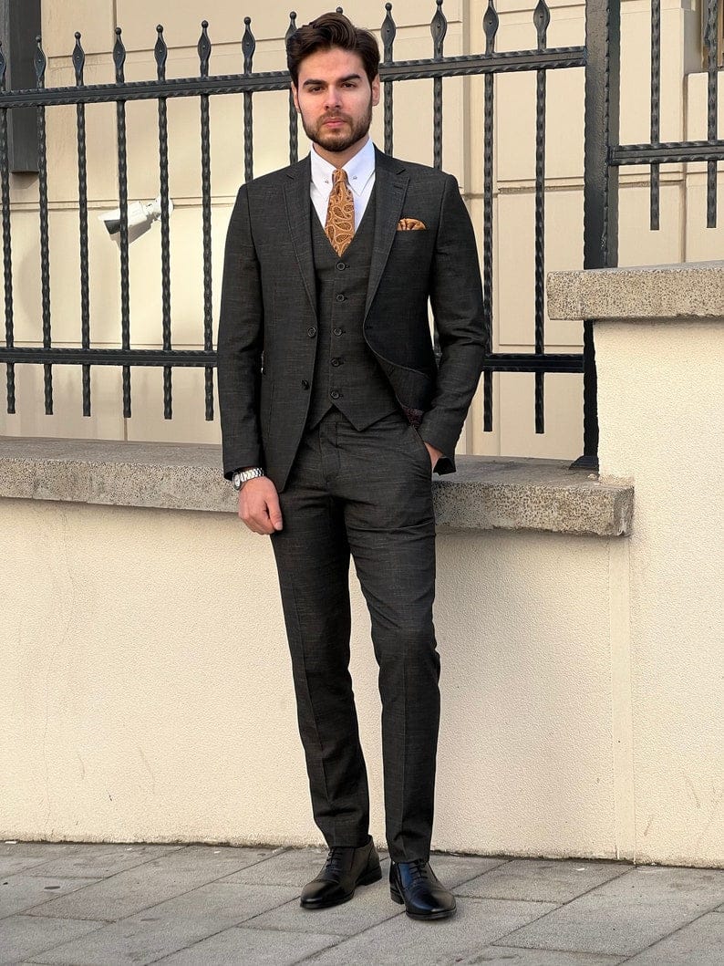
                  
                    Slim Fit Self-Patterned Wool Black Tailored Suit Tuxedo
                  
                