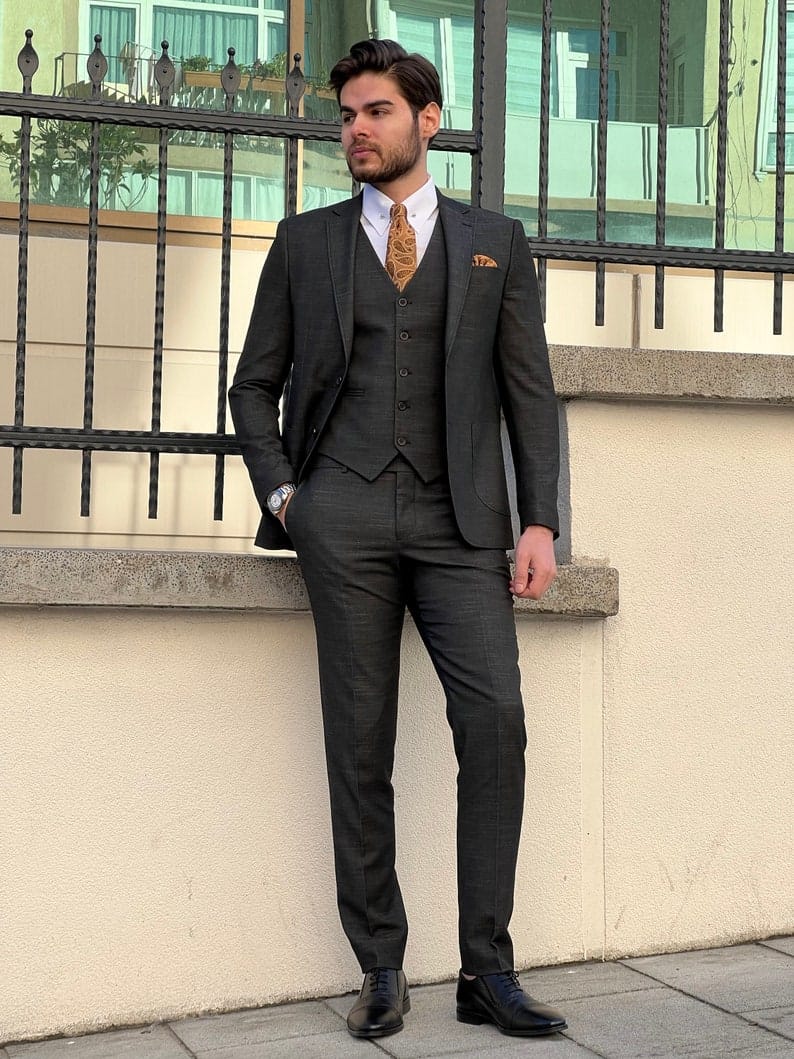 
                  
                    Slim Fit Self-Patterned Wool Black Tailored Suit Tuxedo
                  
                